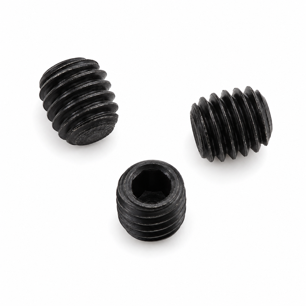 Three black industrial serger set screws on white background